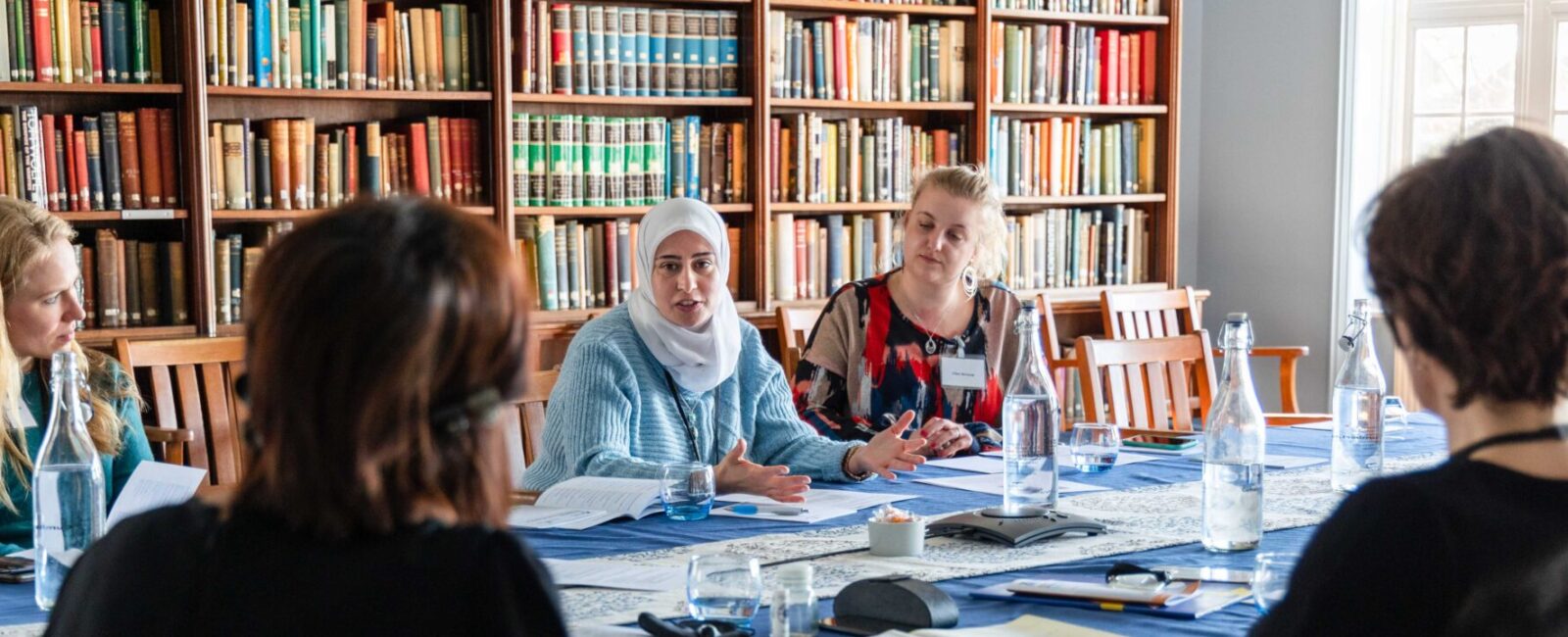 Students take part in a discussion in the Library.