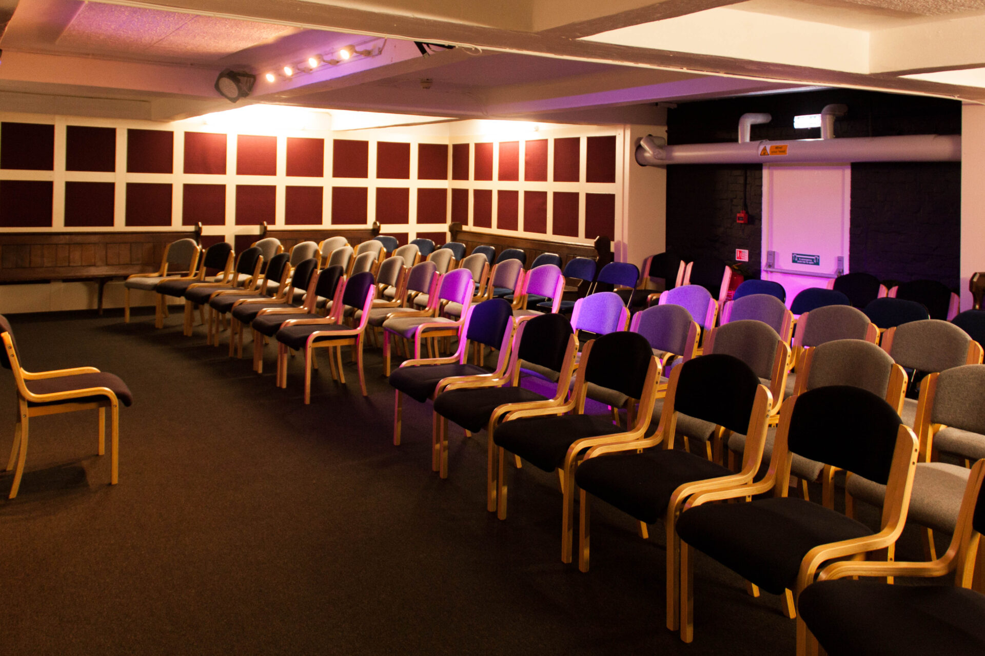 The Vaults entertainment space in the basement of Cumberland Lodge, set up in a theatre layout.