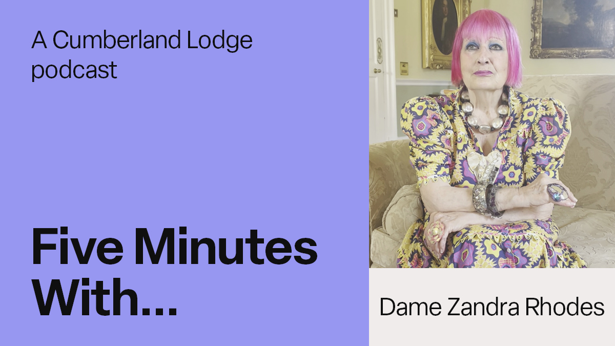 A photograph of Dame Zandra Rhodes in Cumberland Lodge alongside the text: A Cumberland Lodge podcast, Five Minutes With... Dame Zandra Rhodes.