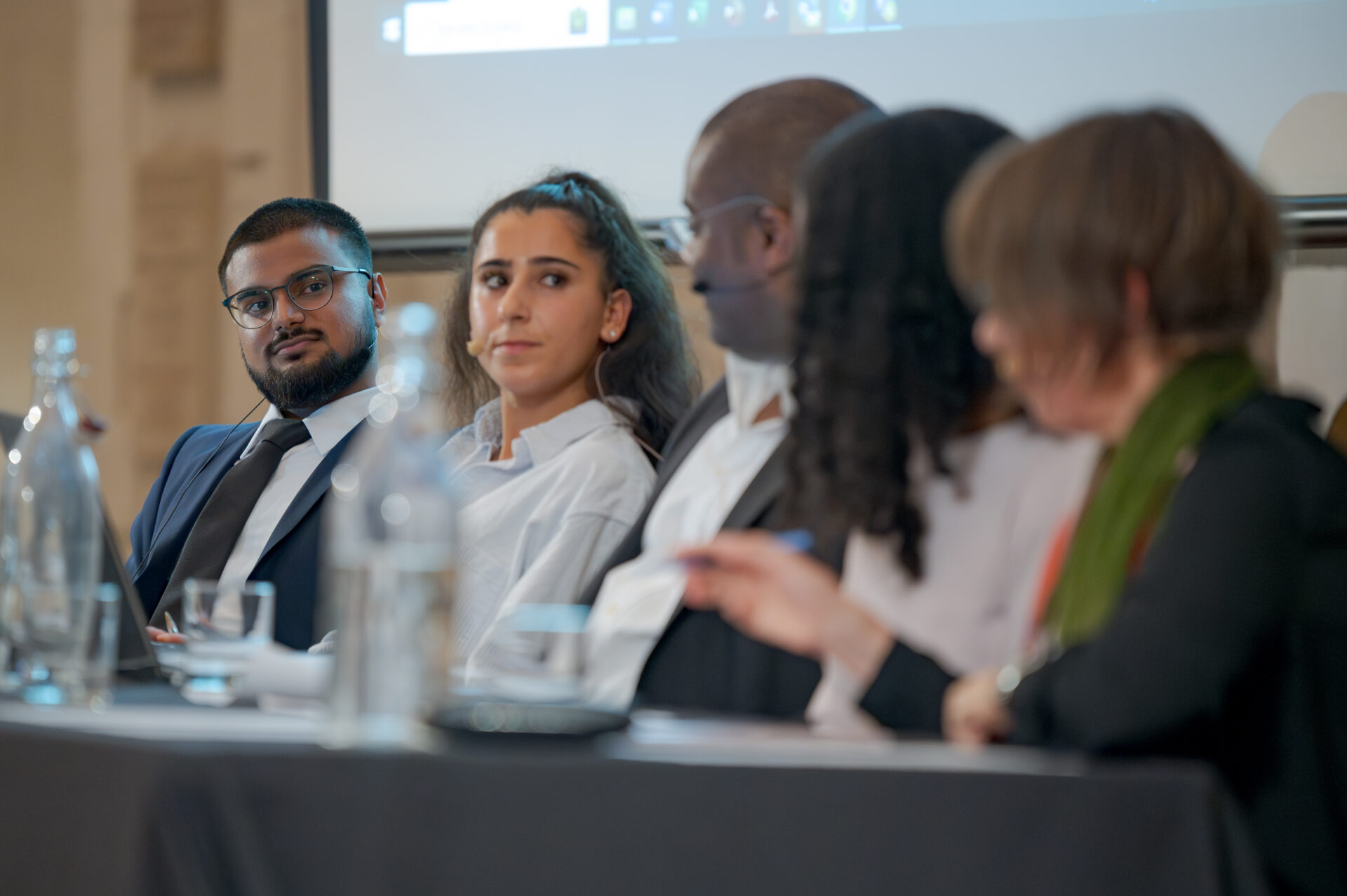 Five panellists sitting along a table at the Gen Z and the City report launch