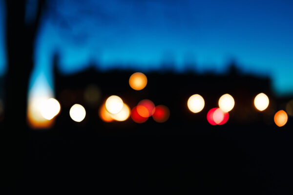 Cumberland Lodge, out of focus and silhouetted against the sunset sky.