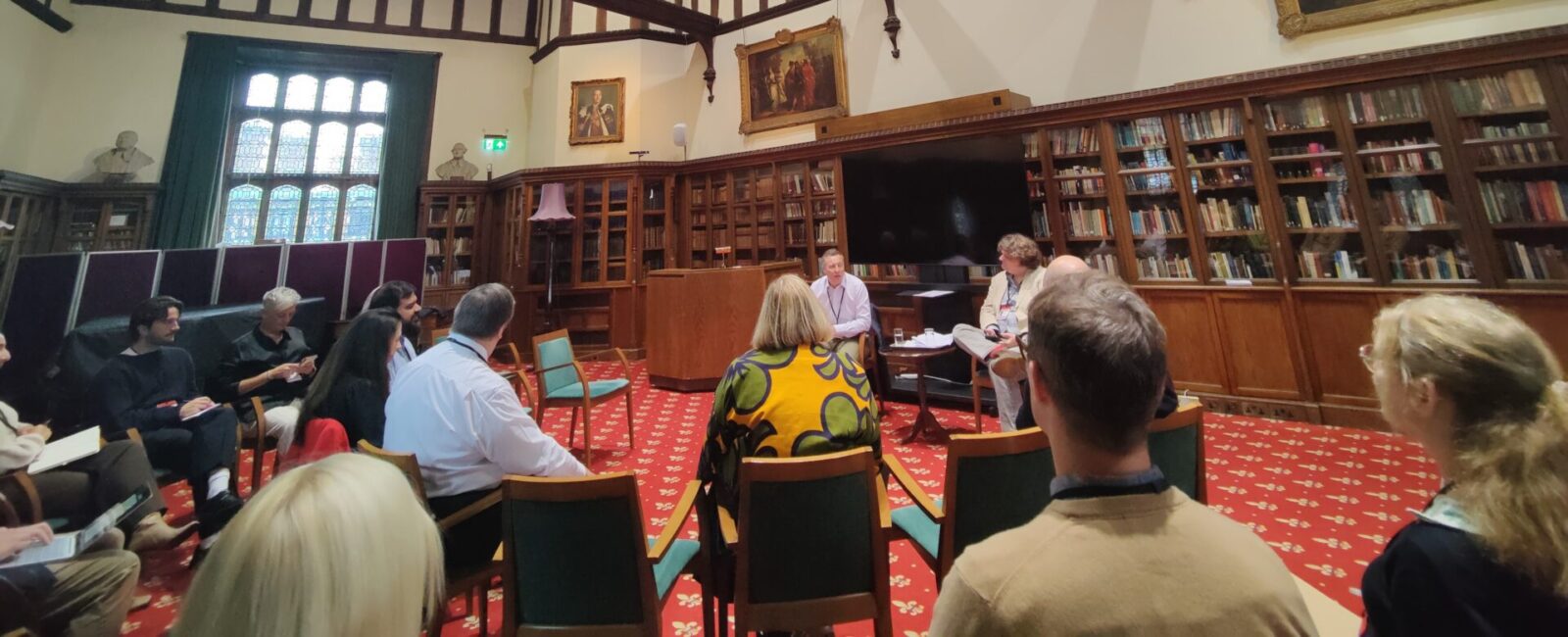 A group in discussion at St George's House