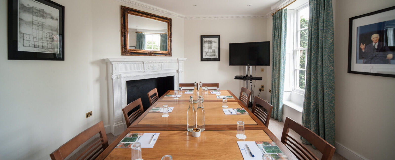 Denning arranged in a boardroom layout