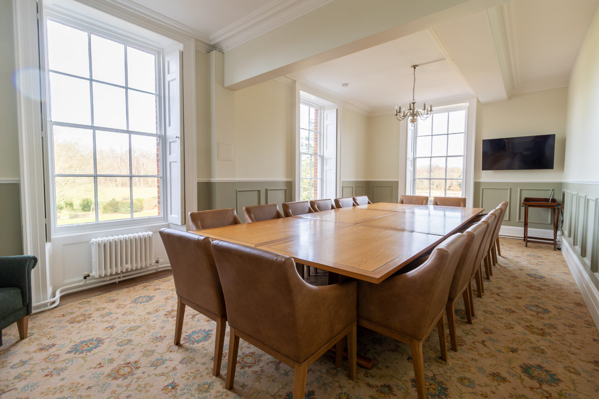 The Anderson meeting room in Cumberland Lodge, set up for 16 people in a board room layout