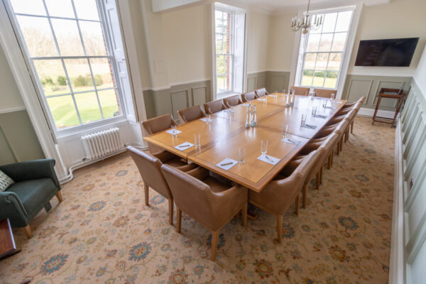 The Anderson meeting room in Cumberland Lodge, set up for 16 people in a board room layout