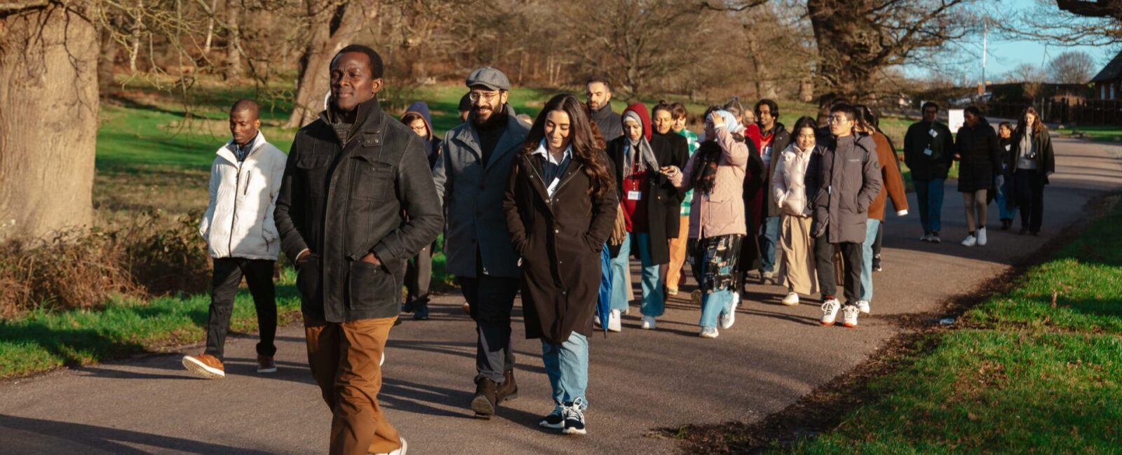 A group of students from the International Christmas Conference 2024 on a walk in Windsor Great Park