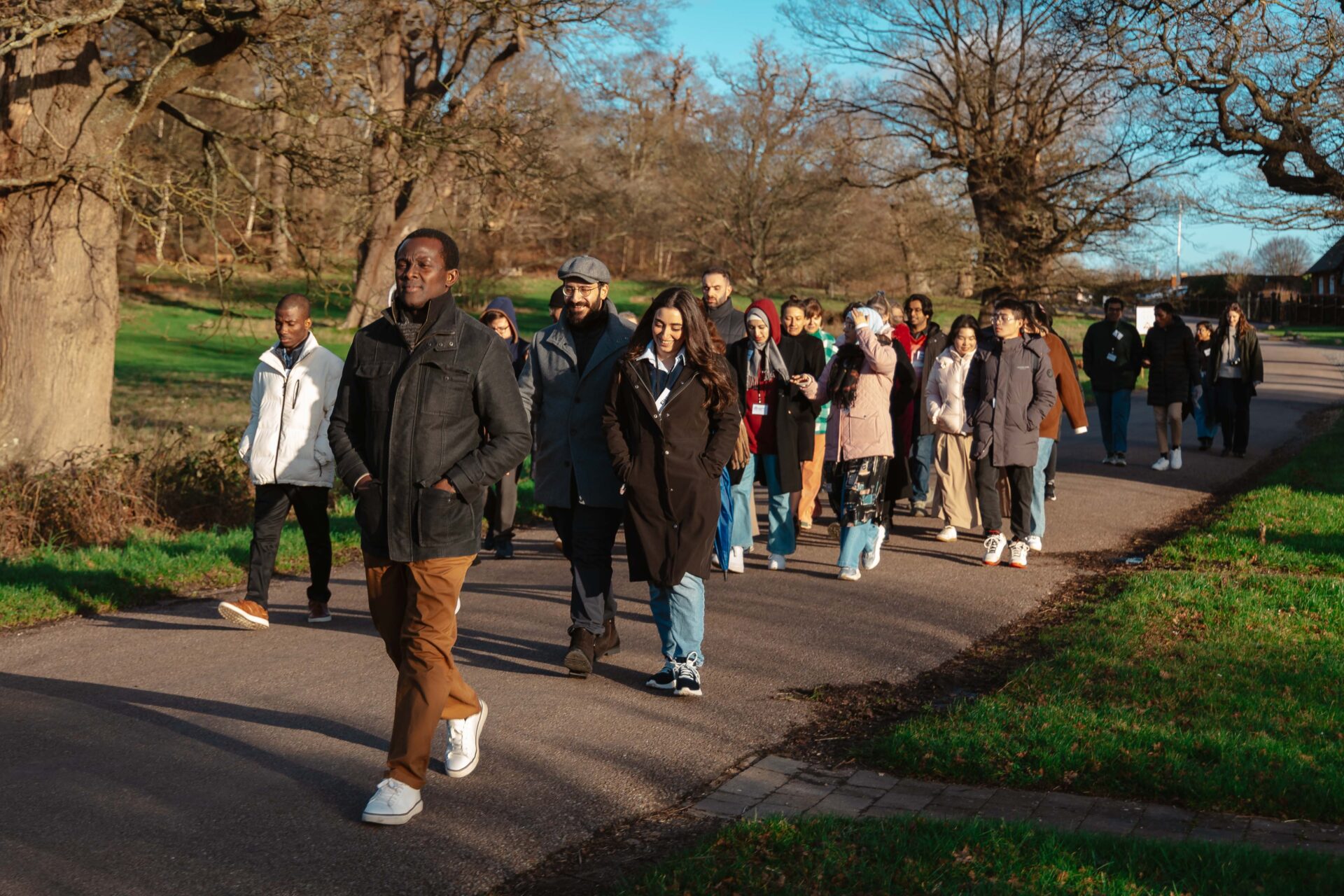 A group of students from the International Christmas Conference 2024 on a walk in Windsor Great Park